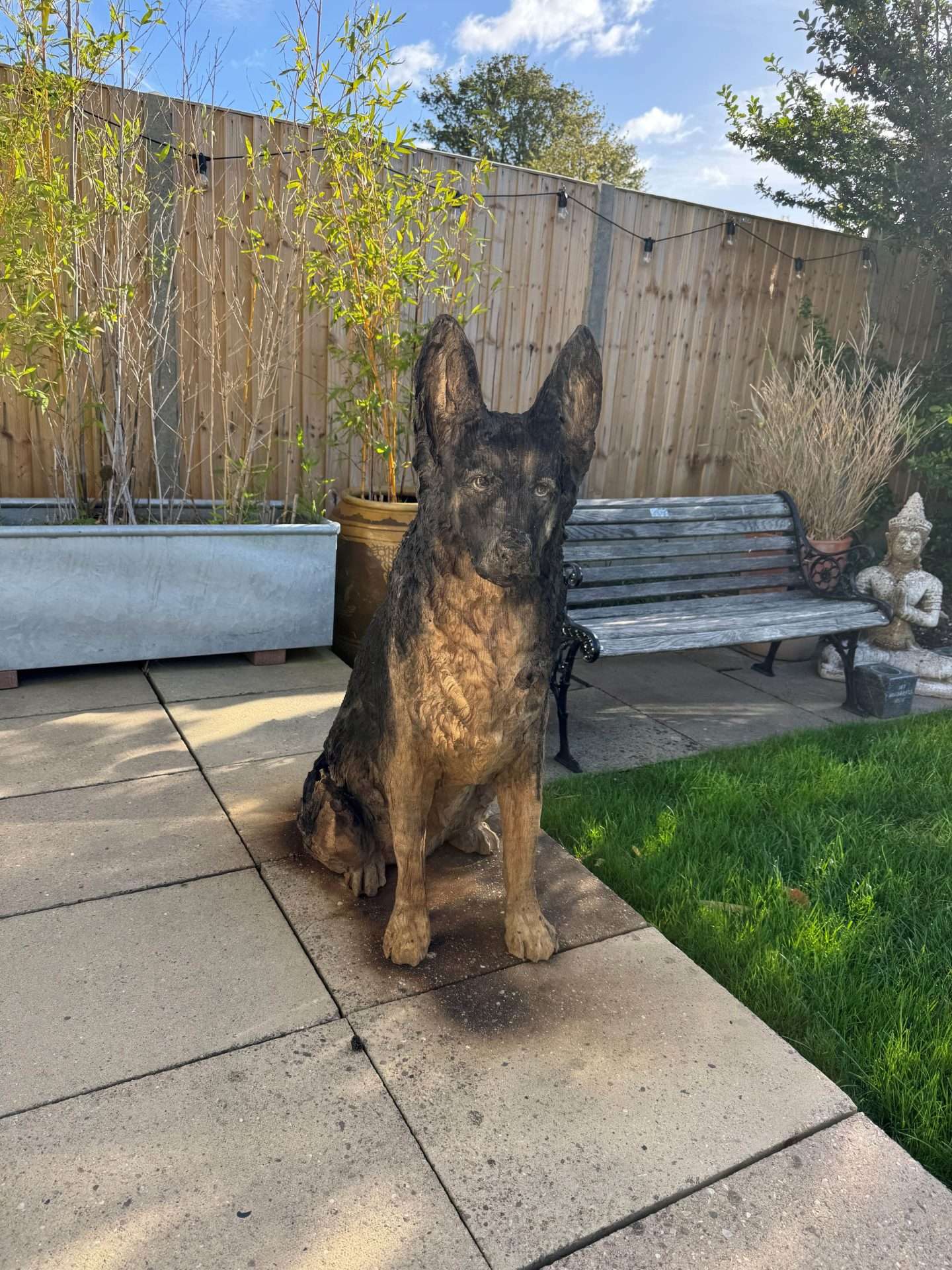 Rex the dog wood carving